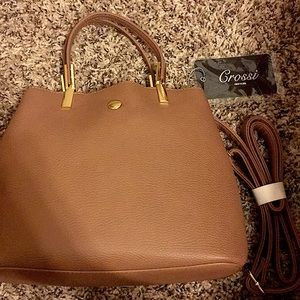 I am selling a mini brown hand bag good quality